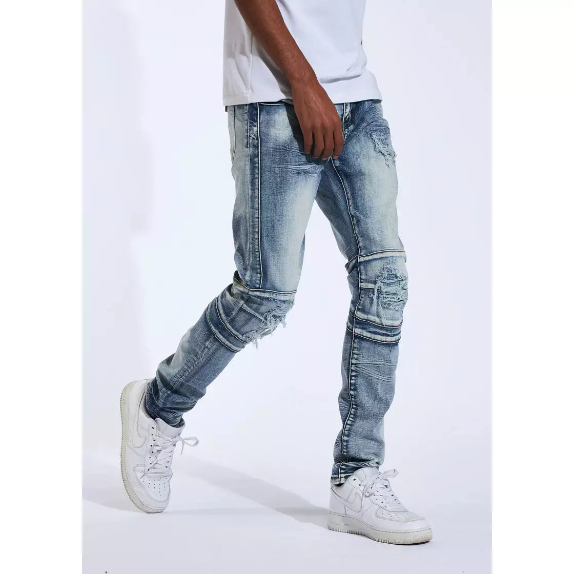 Close-up of the tears and distressed details on the jeans