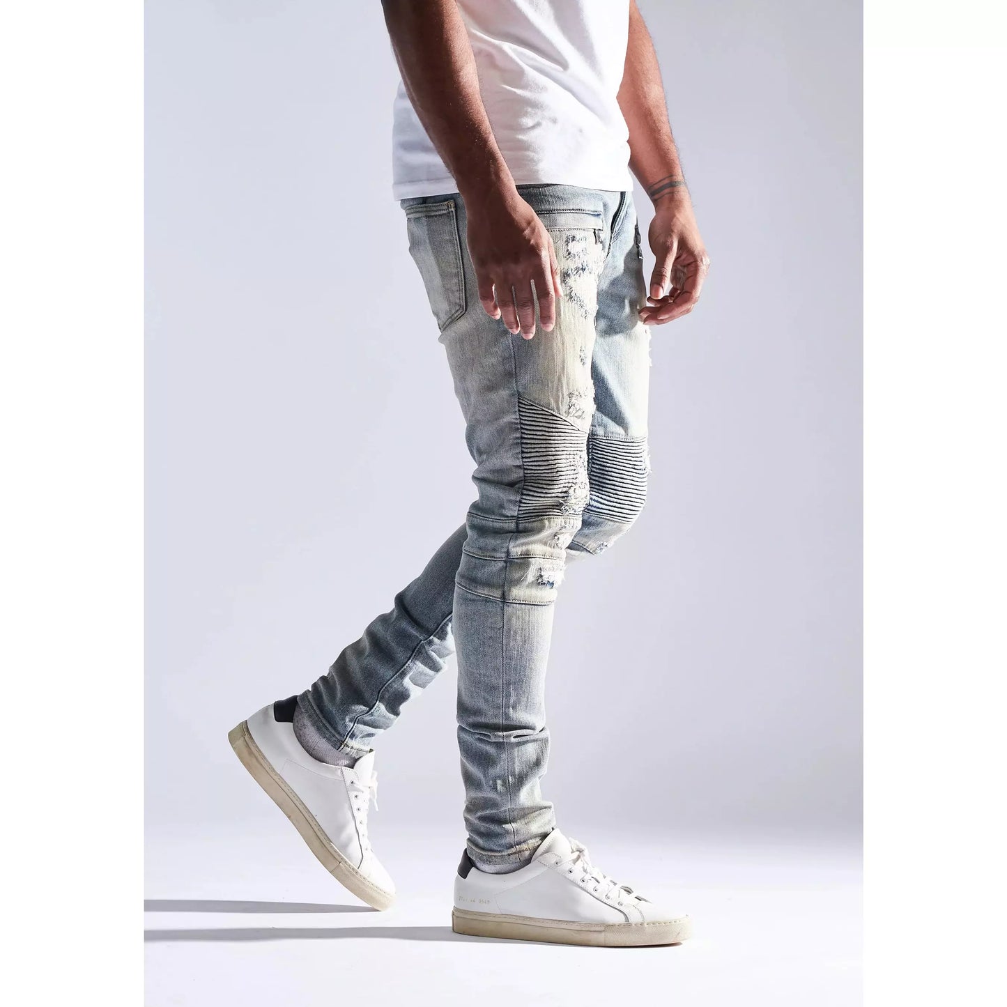 Embellish FB9 Blue Biker Denim Jeans worn by model with black leather jacket and sunglasses