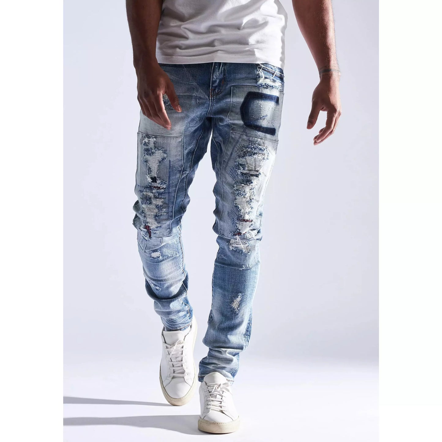 Embellish Light Blue Barker Denim Jeans (EMBHOL21-1-15) with distressed details and tapered fit for stylish casual wear