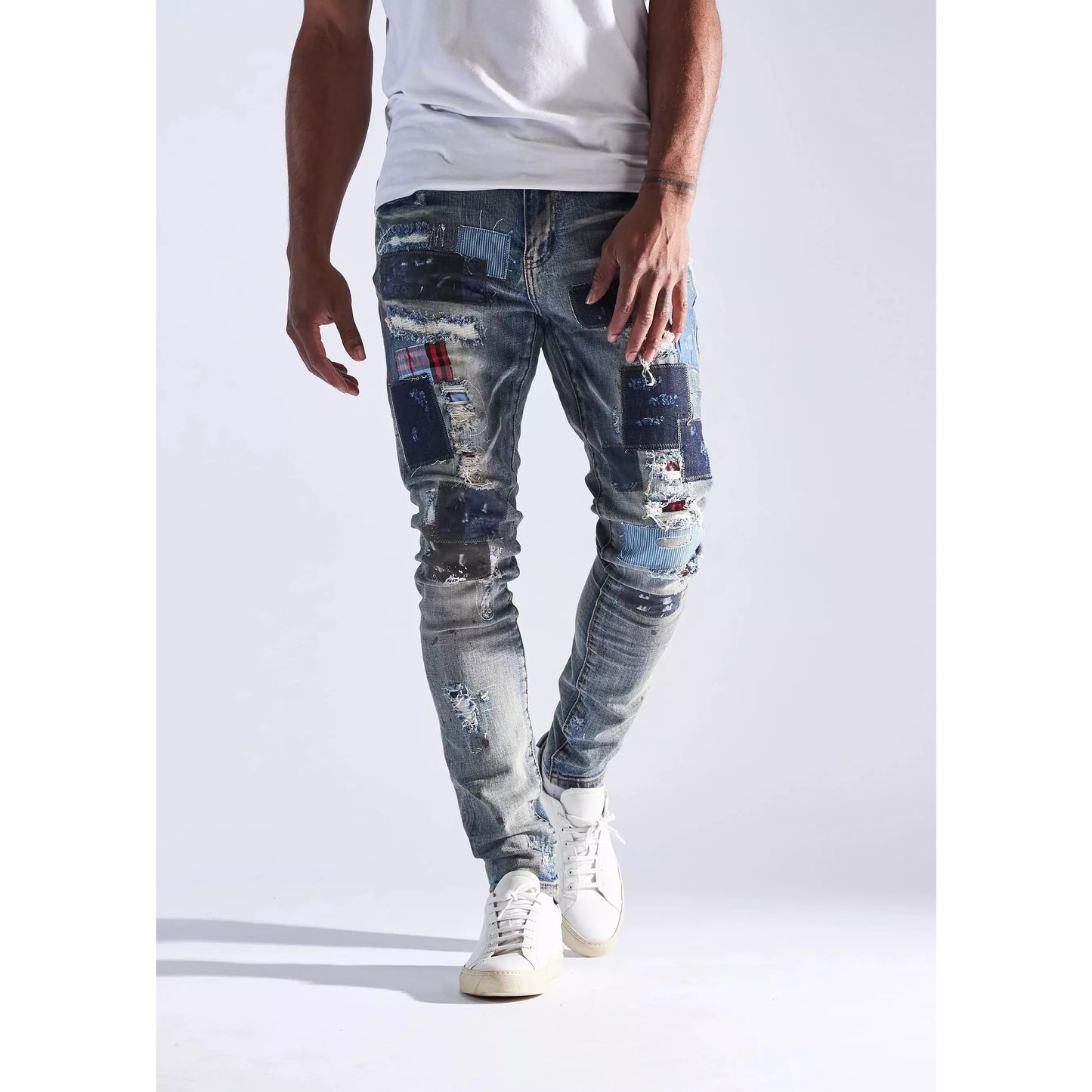 Fashionable denim jeans with a vintage-inspired design and artistic flair