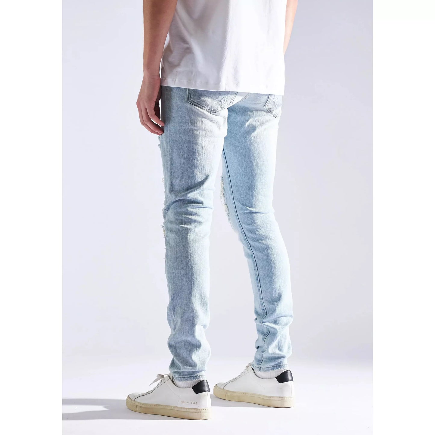 Embellish Cronen Rip & Repair Denim Jeans in light blue wash, featuring distressed detailing and a slim fit (EMBHOL21-1-8)