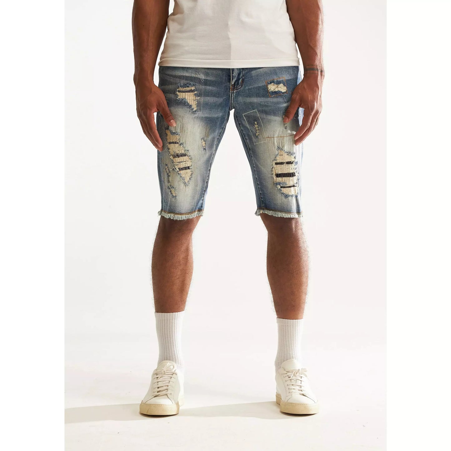 Close up of the distressed denim fabric of Embellish Blue Rinse Tango Shorts (EMBSP222-131)