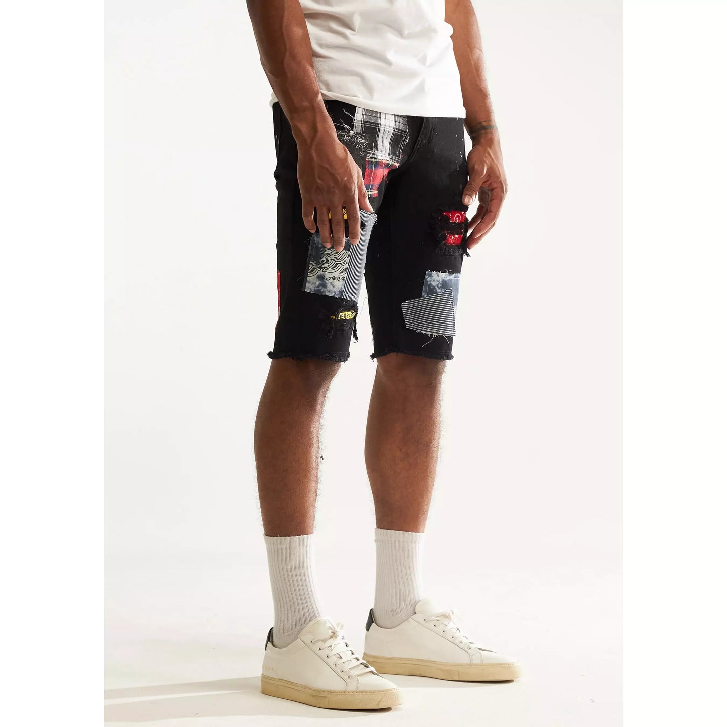 Embellish Black Patch Rebel Shorts (EMBSP222-136) styled with graphic tee and sneakers