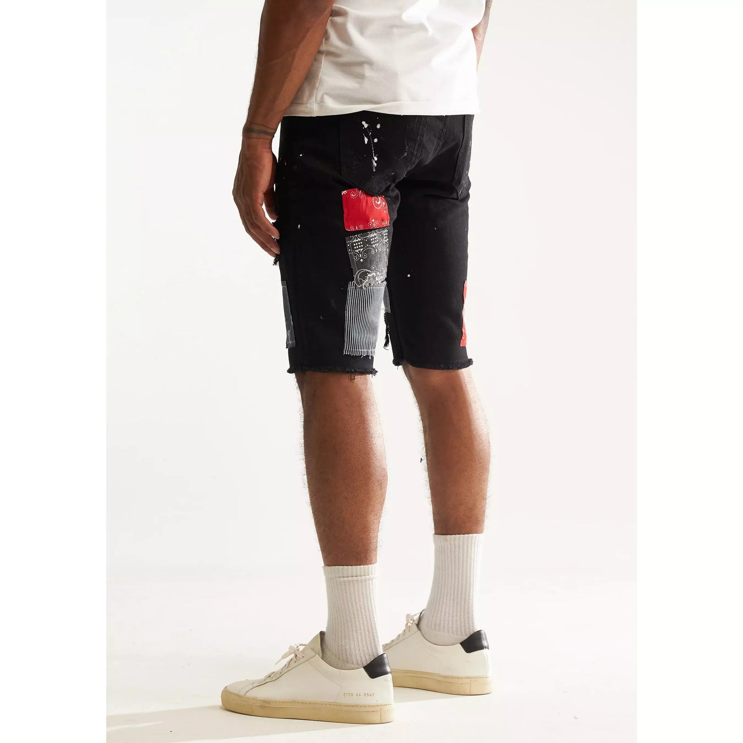EMBSP222-136 Embellish Black Patch Rebel Shorts showcasing edgy and rebellious design elements