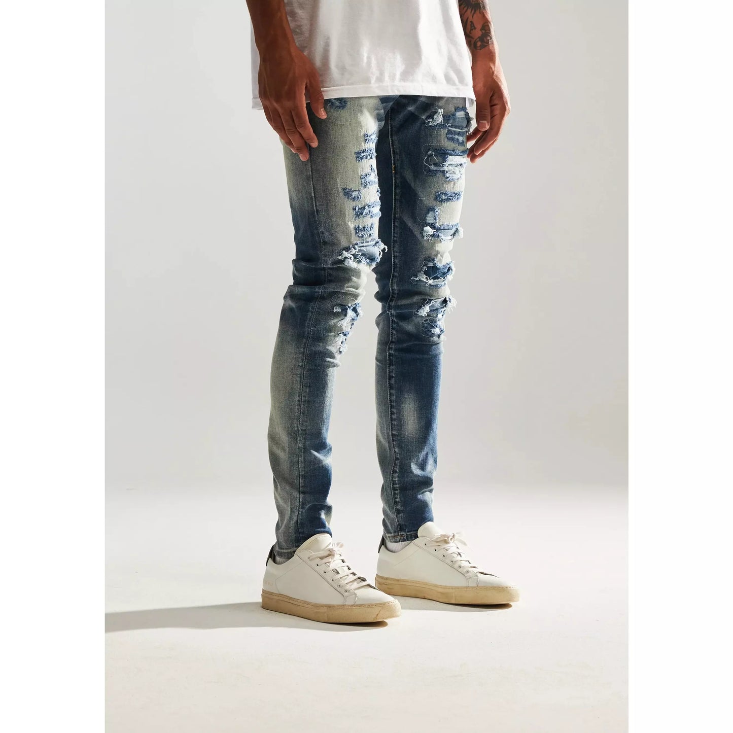 Fashionable Embellish Mont Ripped Denim Jeans with frayed edges and stylish patches