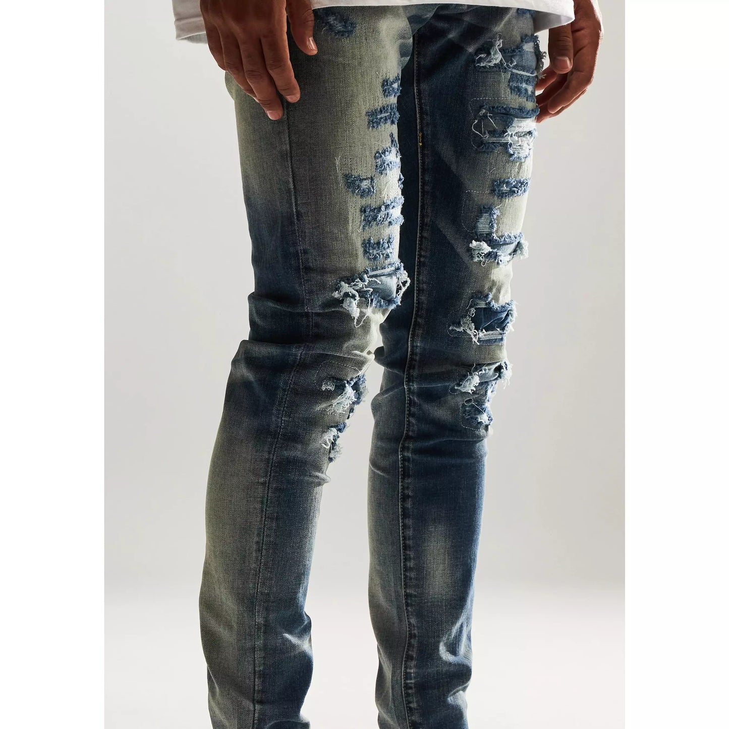 Close-up of Embellish Mont Ripped Denim Jeans with ripped details
