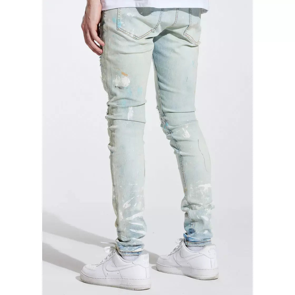 Close-up of Crysp Denim Atlantic Blue Paint Denim Jeans (CRYSPSP221-104) with distressed detailing and stylish design