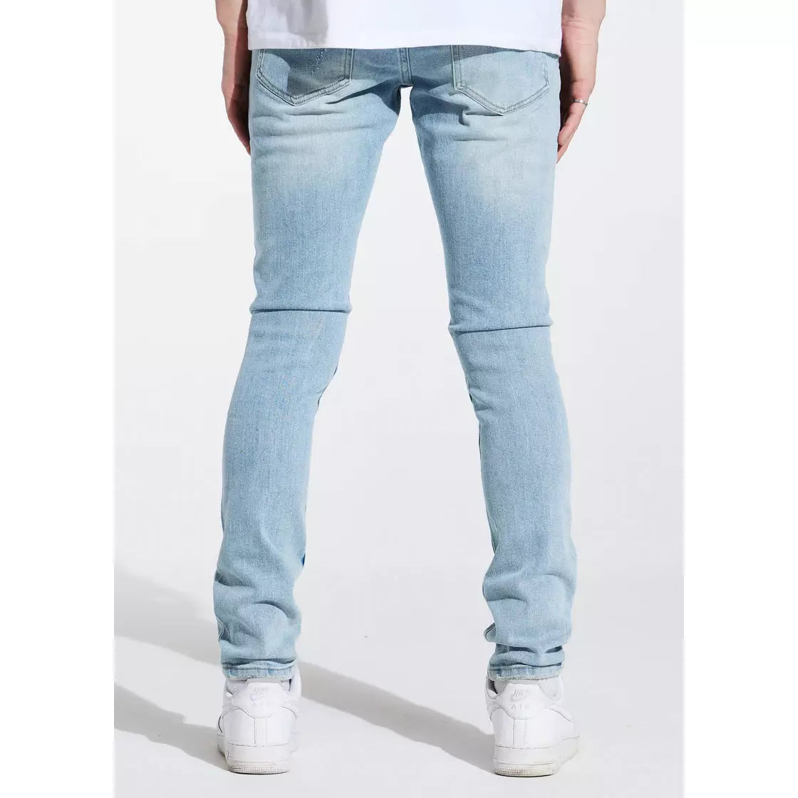 Stylish outfit featuring Crysp Denim Atlantic Blue Denim Jeans paired with a graphic tee and sneakers