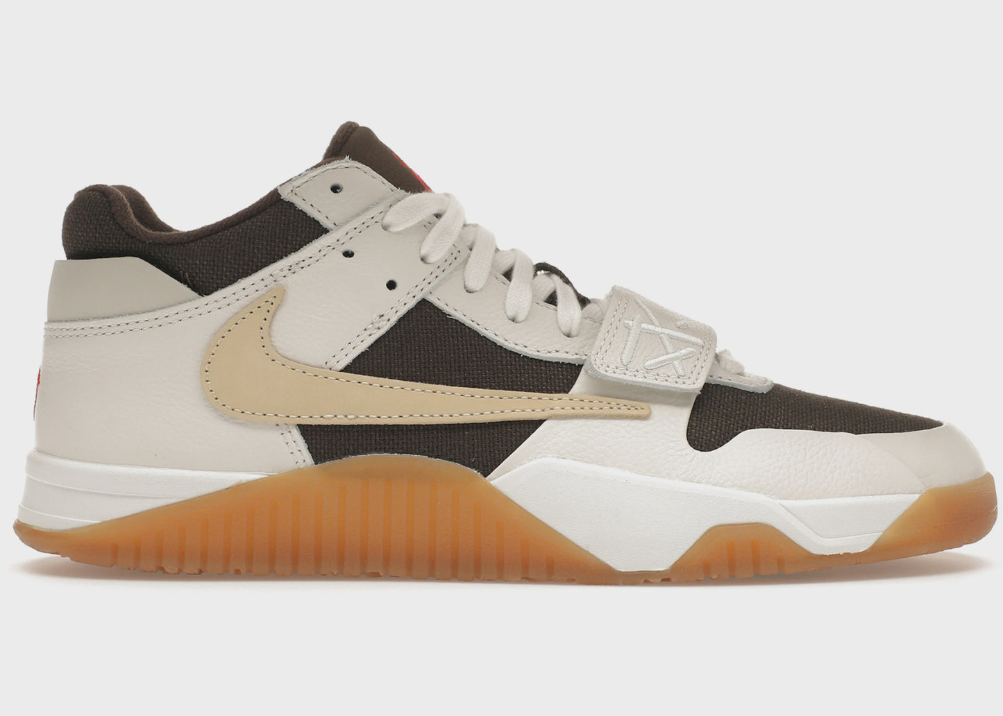 Close up image of the Jordan Jumpman Jack TR - Travis Scott Sail sneaker, featuring a white and cream colorway with the iconic Jumpman logo on the tongue and Travis Scott branding on the heel