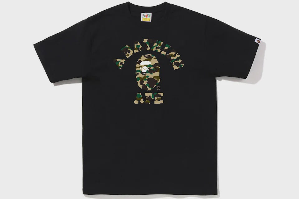 A close-up image of the BAPE 1st Camo College Tee in Black/Yellow (FW22) showcasing its vibrant and eye-catching design