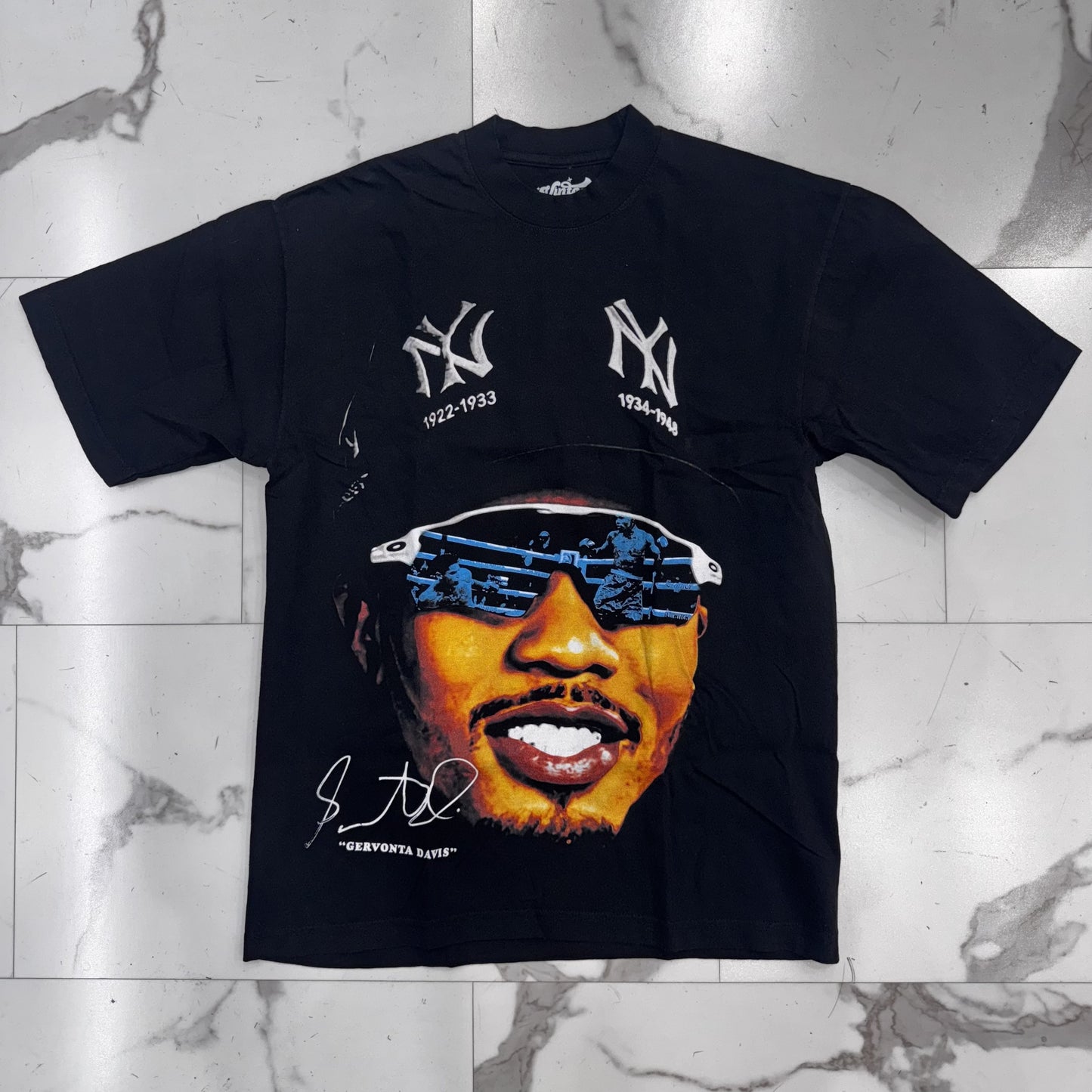 Vintage Demand Gervonta Davis NY Hat Tee in Black, made in Los Angeles with 65 OZ 100% cotton, shrink-free, 1 inch collar, and jumbo print design