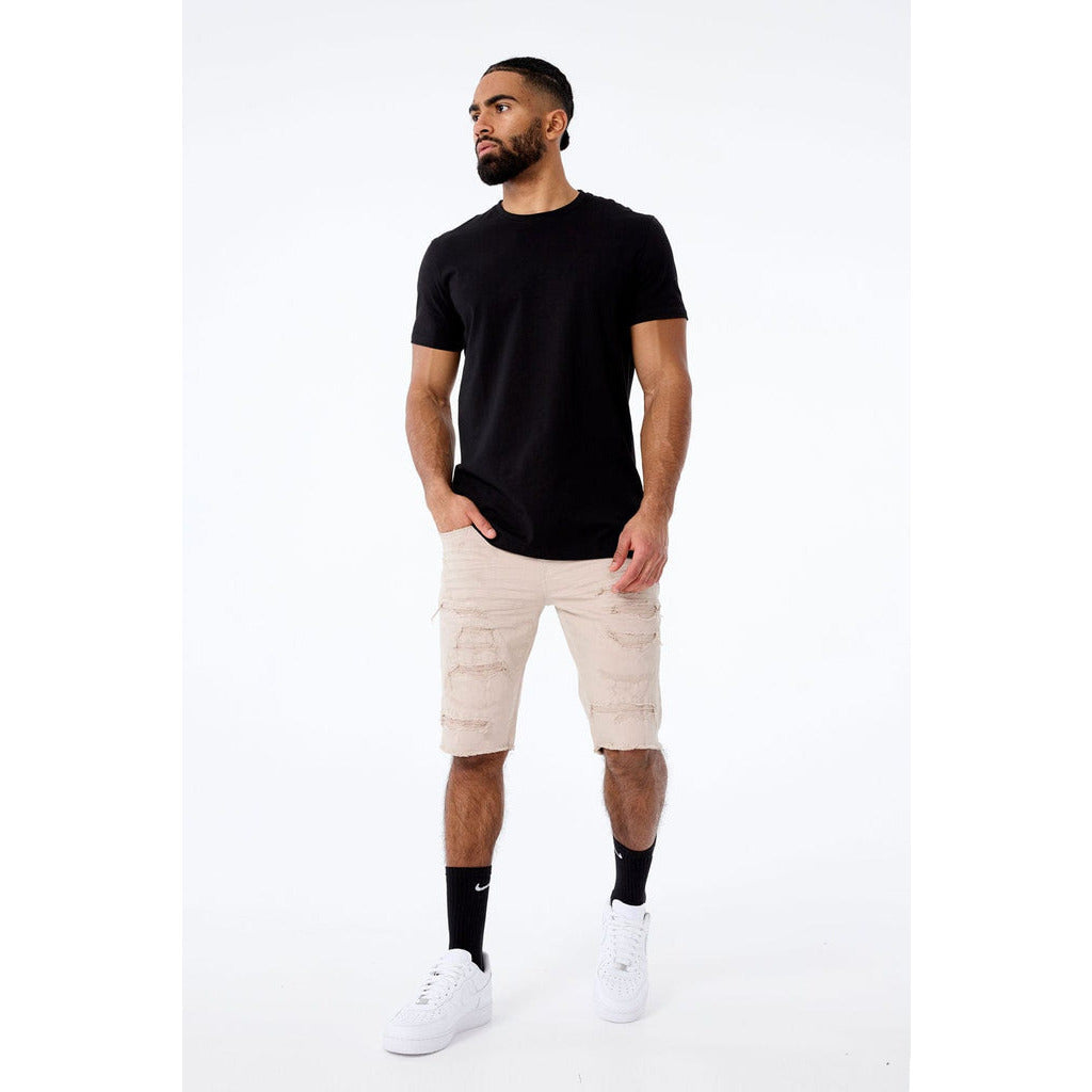Two back and two front pockets, a zipper fly, and belt loops on the Jordan Craig Tulsa Twill Denim Shorts in Latte
