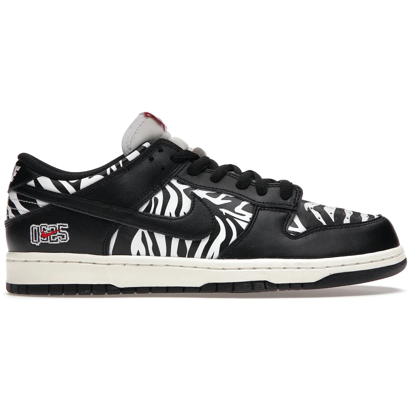 Black and white Nike SB Dunk Low OG QS - Quartersnacks Zebra (DM3510-001) sneaker with zebra print and iconic Nike swoosh logo