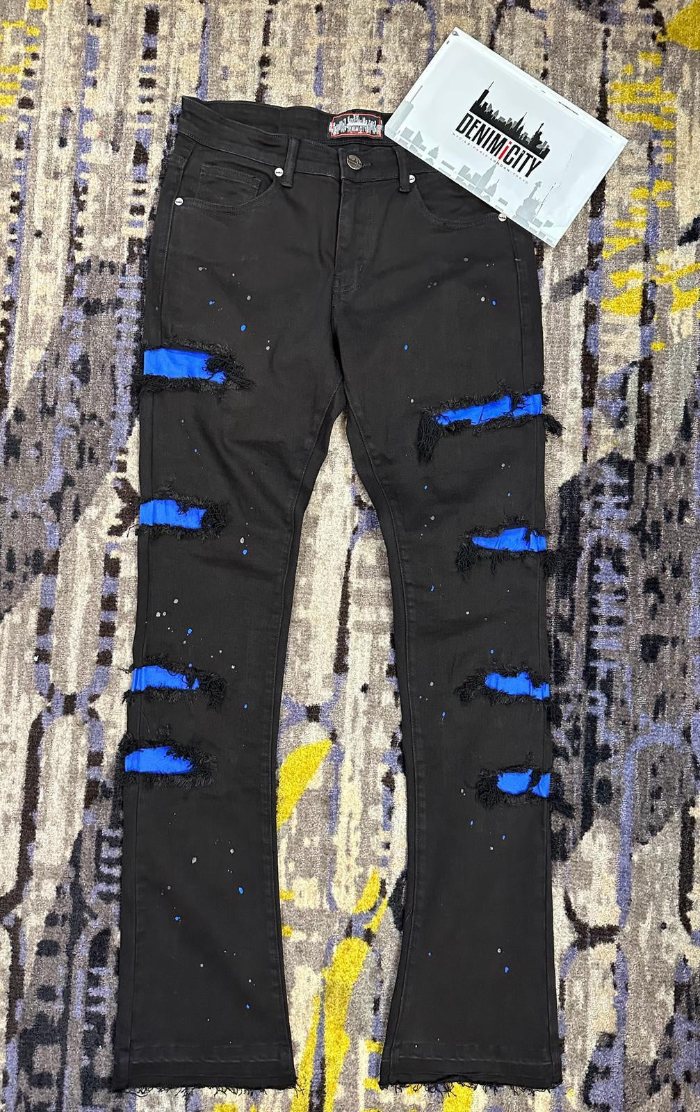 Close-up image of DENIMiCITY Jet Black Ripped Stacked Flare Denim (DNM-K120) showcasing trendy ripped details and flattering flared silhouette