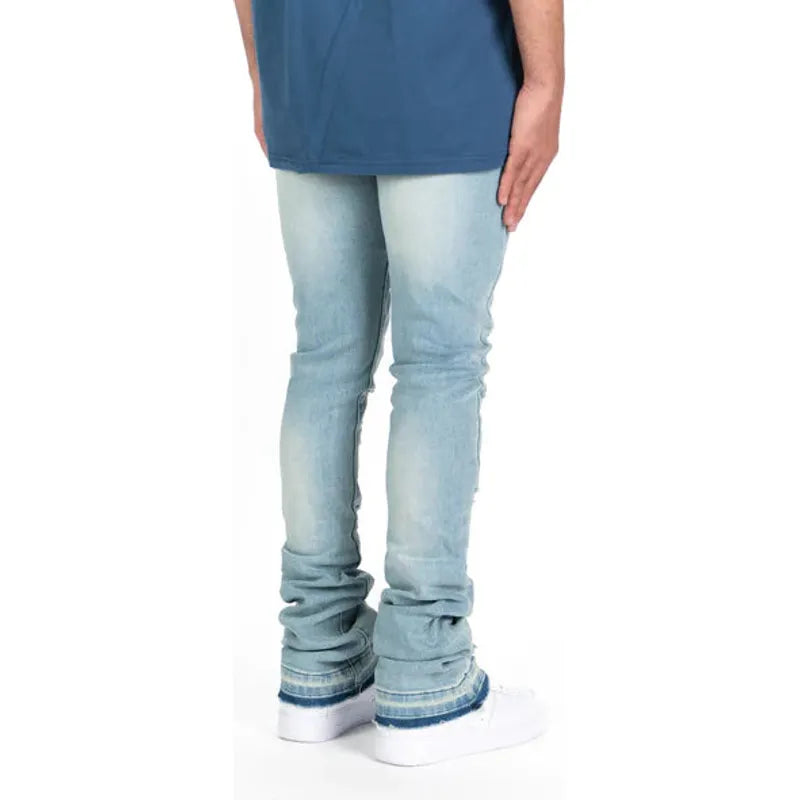 Light blue flare stack denim jeans by PHEELINGS with 'Now Or Never' design