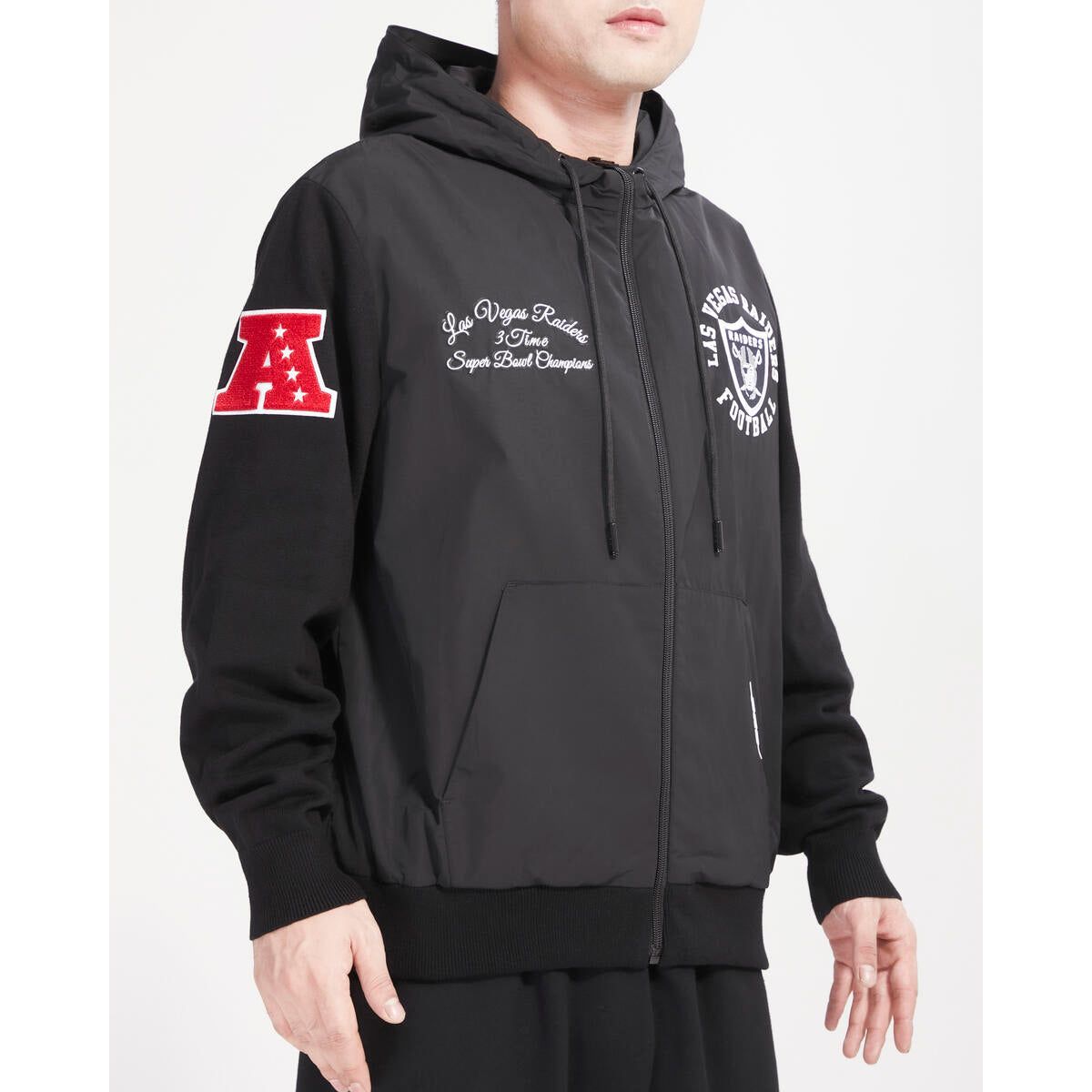 Black Las Vegas Raiders hybrid woven zipper hoodie with Pro Standard branding