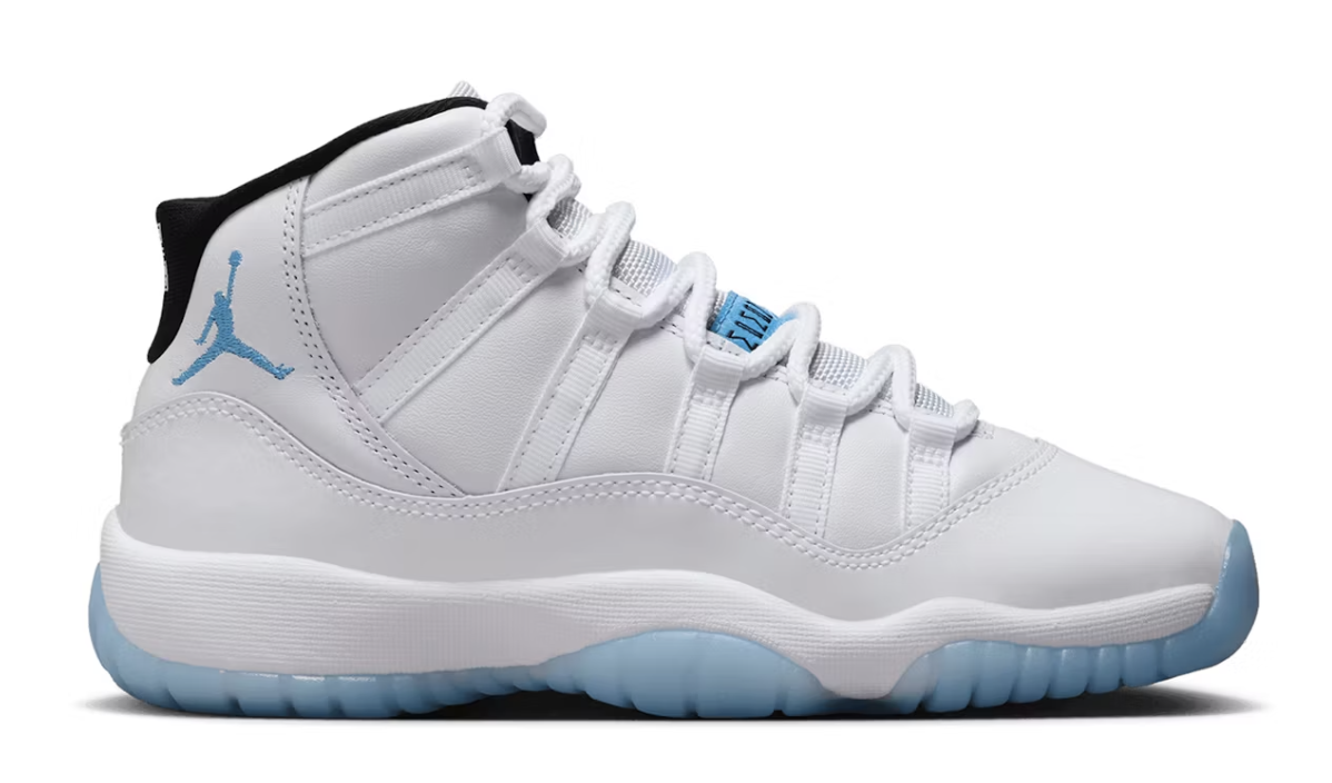 High-quality image of the Jordan 11 Retro - Legend Blue (GS) (2024) (378038-104) sports shoe, featuring a white and blue colorway with patent leather accents