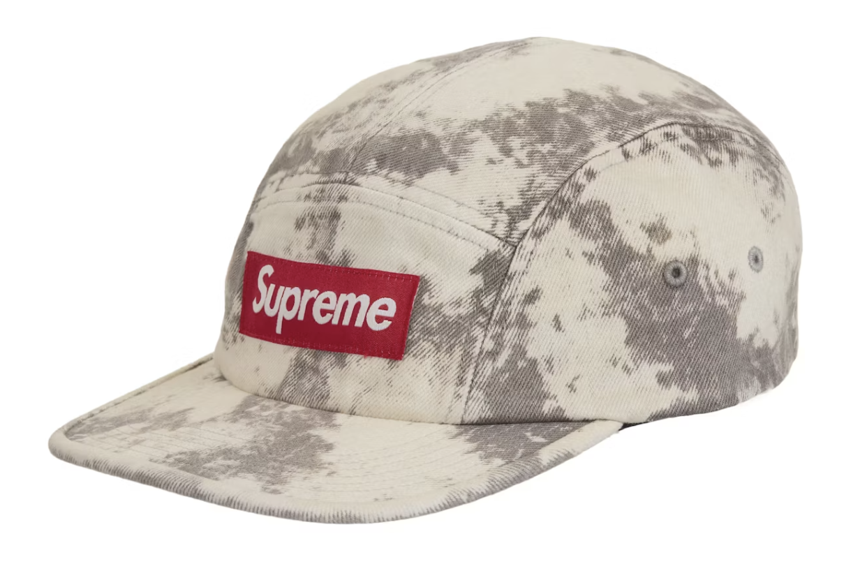 A brand new Supreme Denim Camp Cap in bleached color with SS25 branding, showcasing a stylish and durable design perfect for streetwear enthusiasts