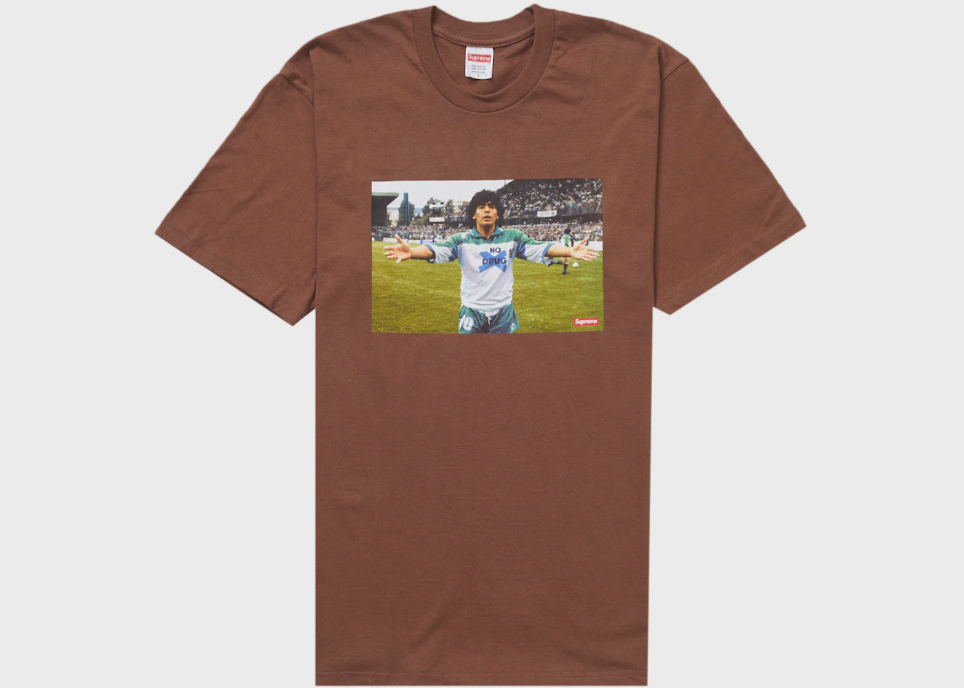 Brown Supreme Maradona Tee featuring an iconic image of the football legend