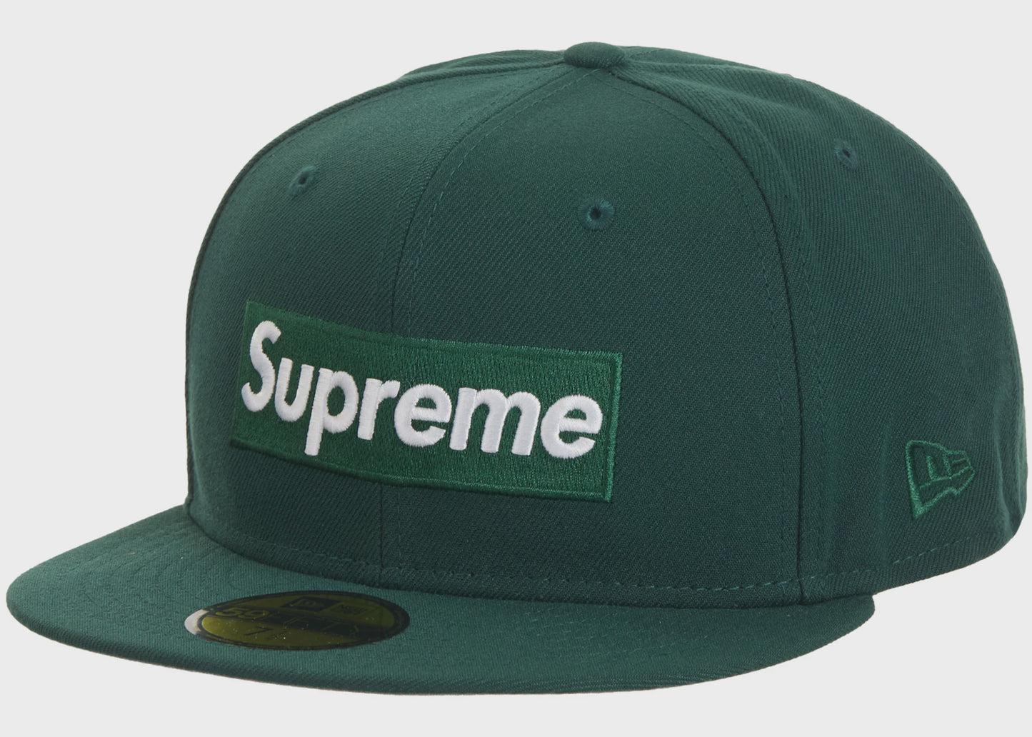A close-up image of the Supreme Sharpie Box Logo New Era Fitted Hat in green, showcasing the embroidered logo and high-quality fabric