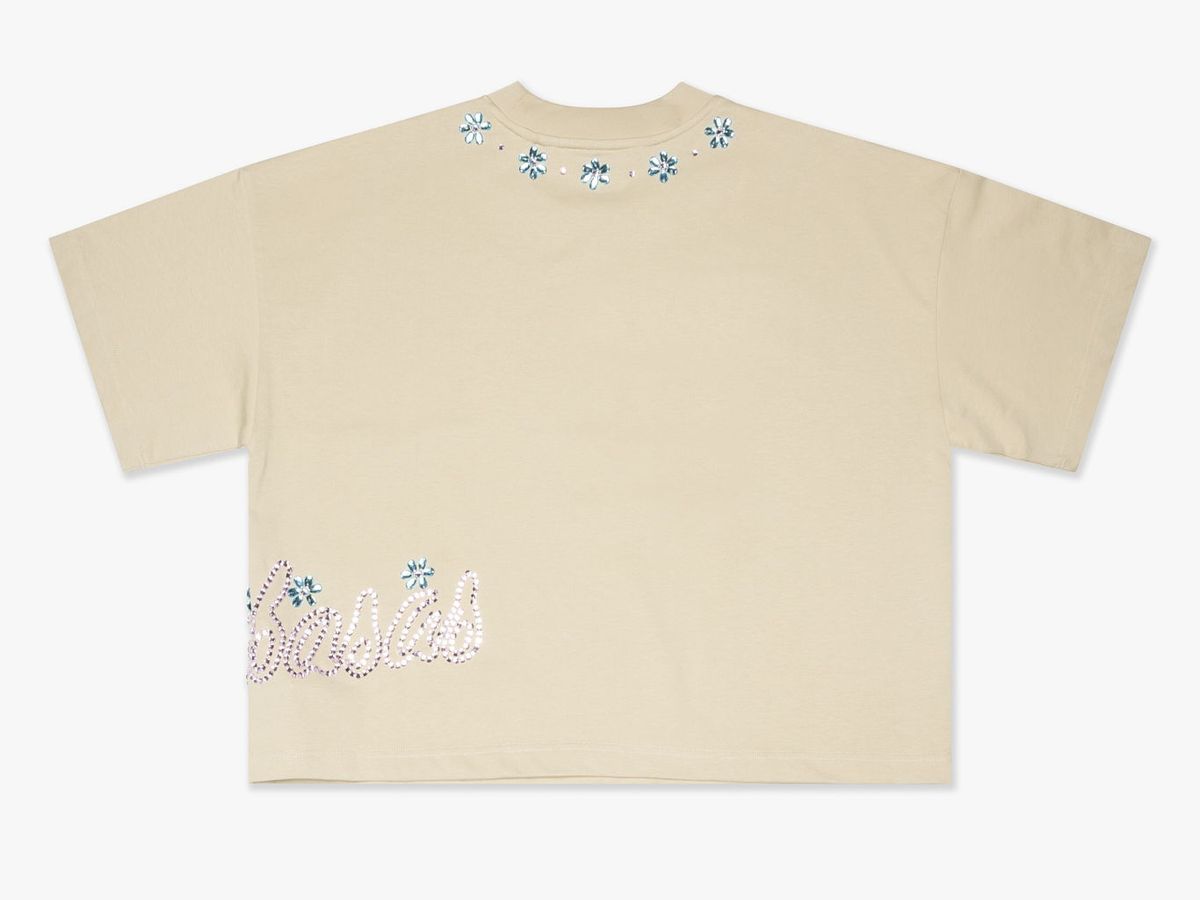 Full-length display of the Valabasas Gem Cream Tee emphasizing its relaxed silhouette and versatile style