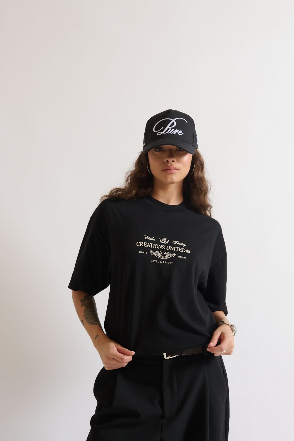 Detailed shot of the fabric texture of the PURE Monclair Black Tee showing 200 grams cotton weight