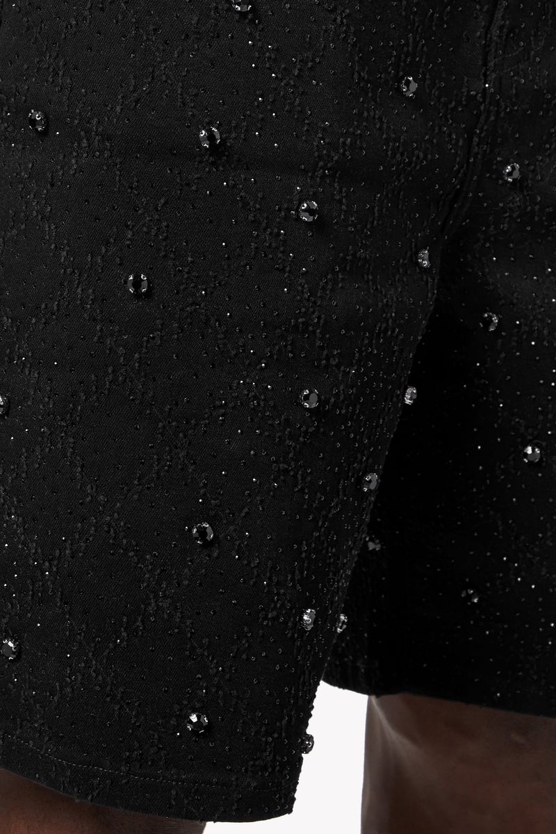 Guapi All Black Embellished Denim Shorts featuring intricate beadwork and stylish distressed details for a trendy summer look