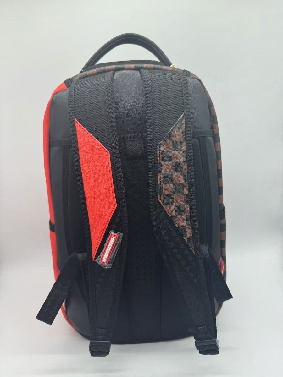 Full view of the Sprayground Taz Destroy Backpack with dimensions 18x115x65 inches, made from 100% PVC material for durability