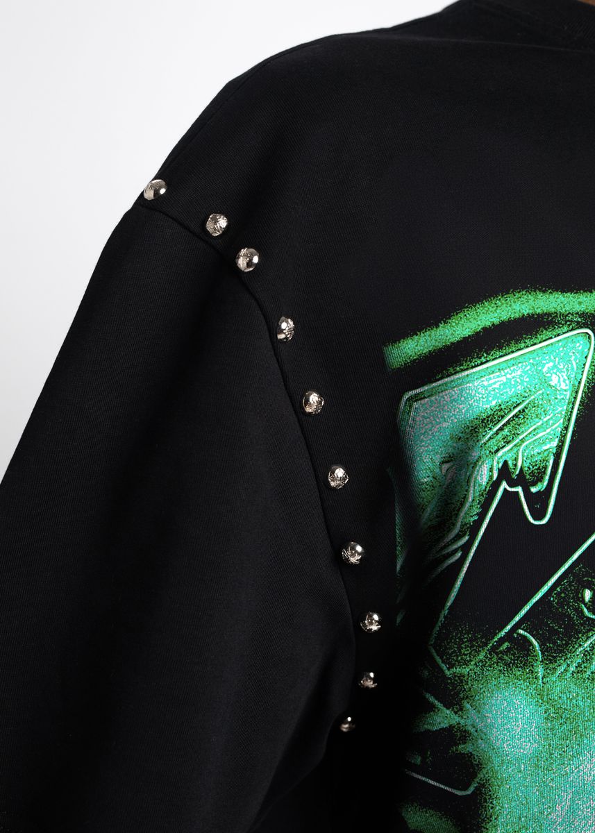 Model wearing Guapi Slime Obsidian Black Tee in a stylish urban setting