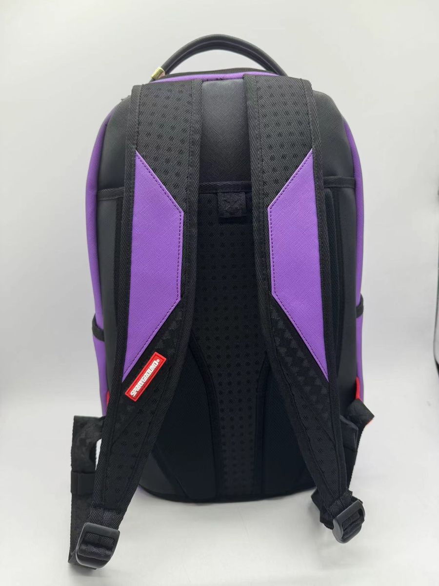 Stylish and functional Sprayground Purple Shark Central DLXVS Backpack featuring ample storage space and eye-catching shark imagery