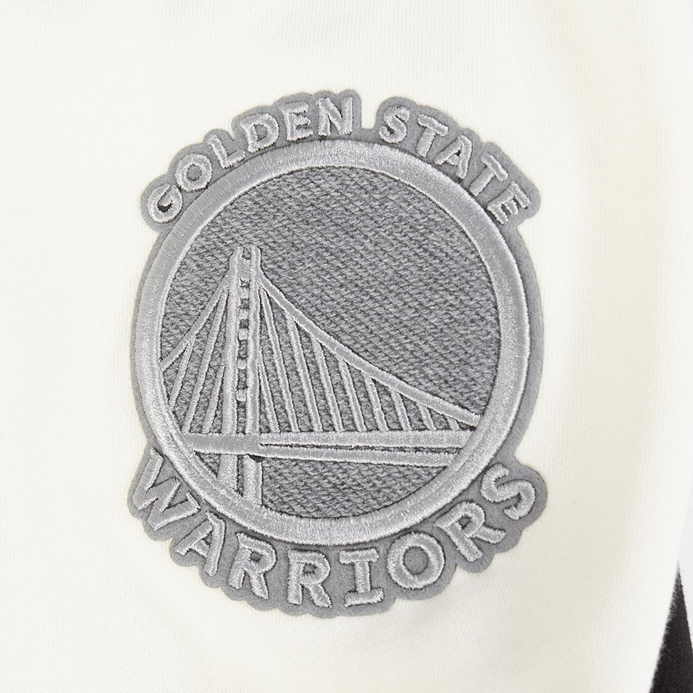 Zoomed-in image of the hoodie’s cuffs and hem made from durable French Terry fabric in black, grey, and eggshell