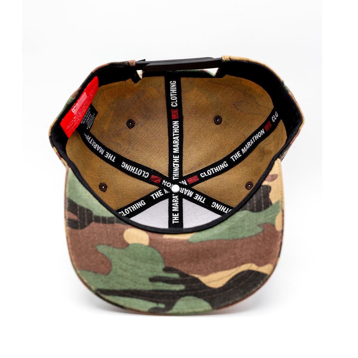 Close-up of the 100% polyester material and detailed embroidery on the green camo Crenshaw snapback hat