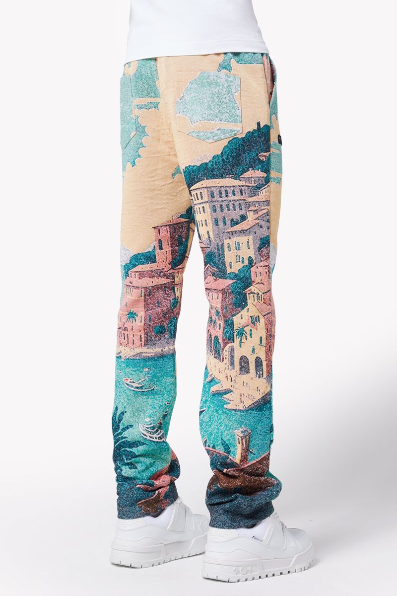 Guapi Portofino Tapestry Pants in vibrant shades of blue and green, featuring a unique tapestry pattern and a comfortable fit for all-day wear