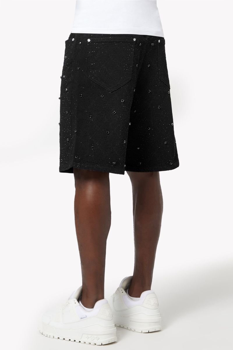 Stylish Guapi All Black Embellished Denim Shorts featuring intricate embellishments and a trendy fit for casual summer wear