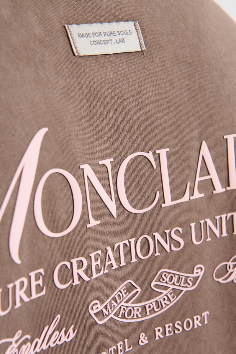 Back view of PURE Monclair Brown Tee displaying clean design and seamless stitching