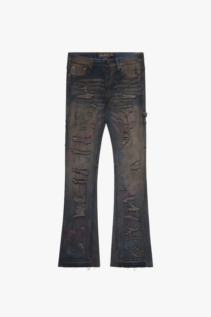 Valabasas Zero Dark Grey Wash Stacked Flare Jeans on model standing in front of a city skyline at dusk