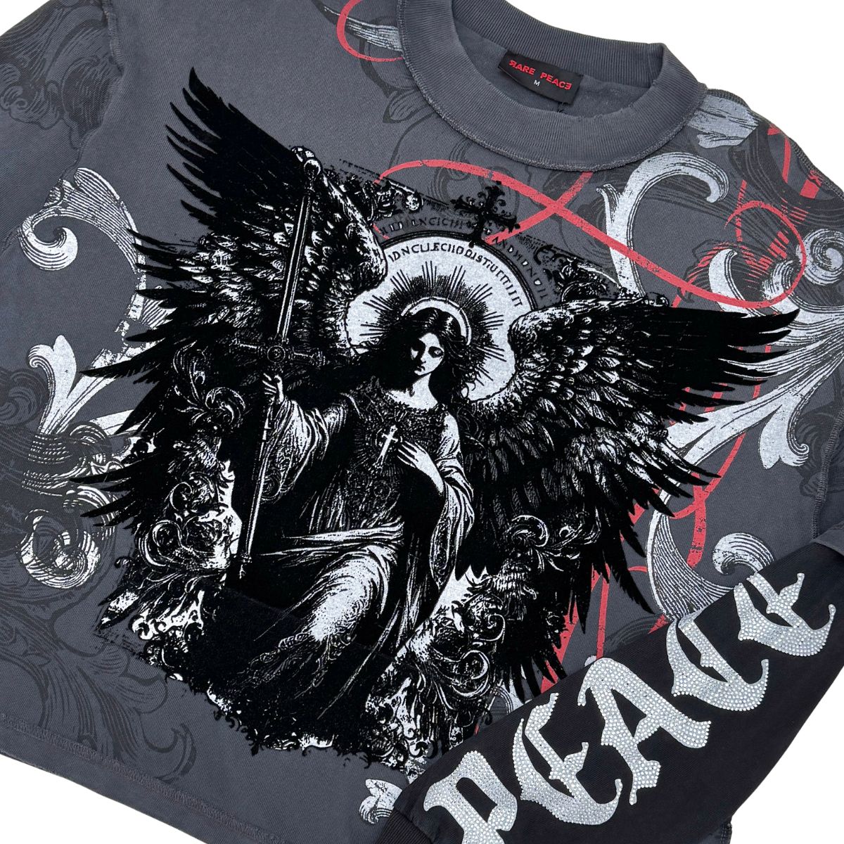 Close-up of the Rare Peace RP End of Pax Americana Twofer Longsleeve with detailed design on dark grey material