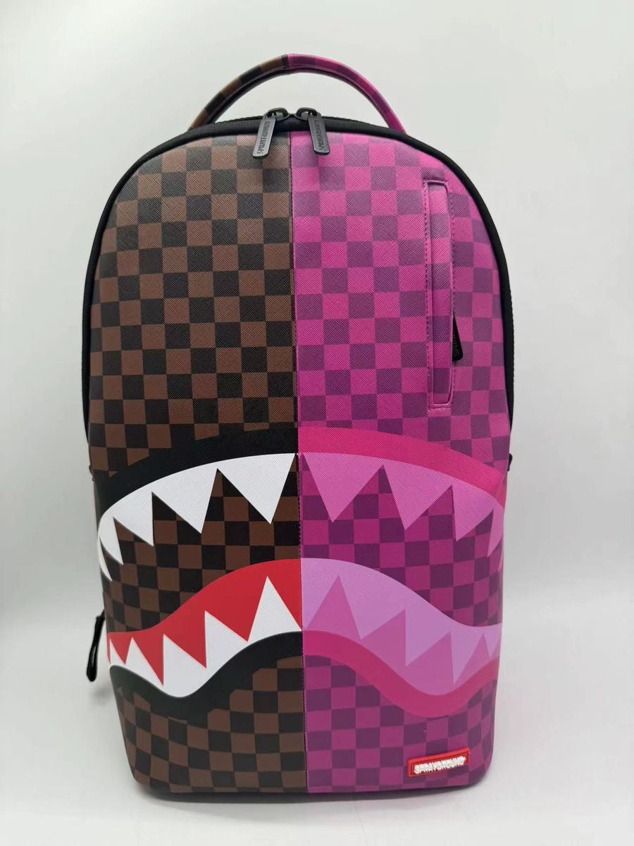 Close-up of the pink check pattern on the Sprayground Split Sip backpack showcasing durable PVC material