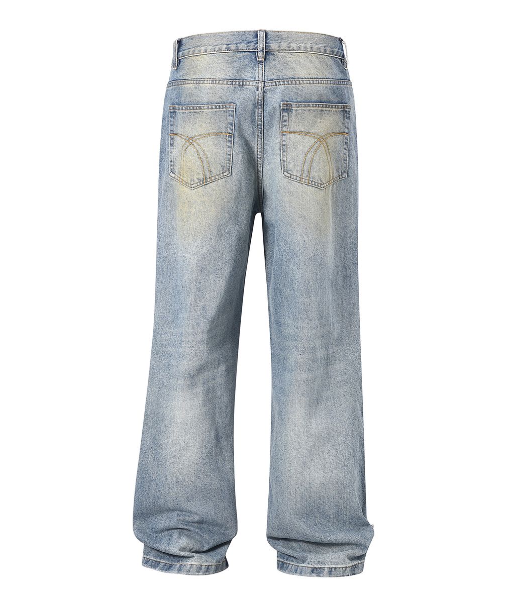 Denim jeans featuring light stone wash, heavyweight fabric, and side gemstone embellishments in Azul color