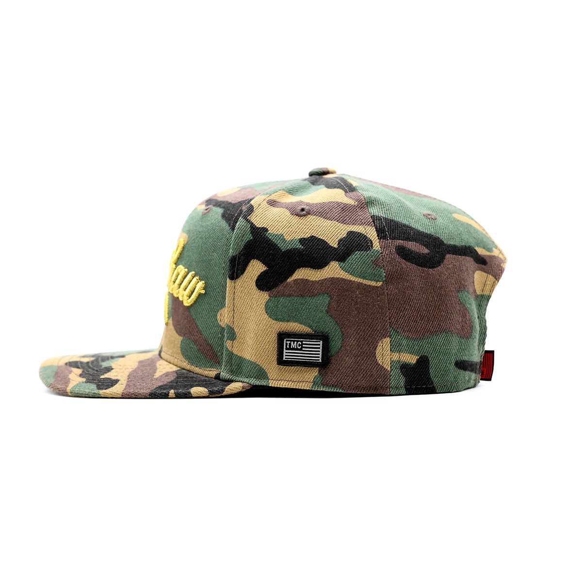Front view of the green camo snapback hat with flat brim and embroidered Crenshaw logo prominently displayed