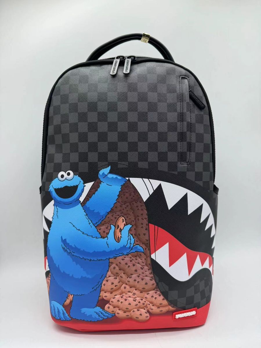 Sprayground Sesame Street Cookie Monster Sneaking A Bite Backpack (B7141)
