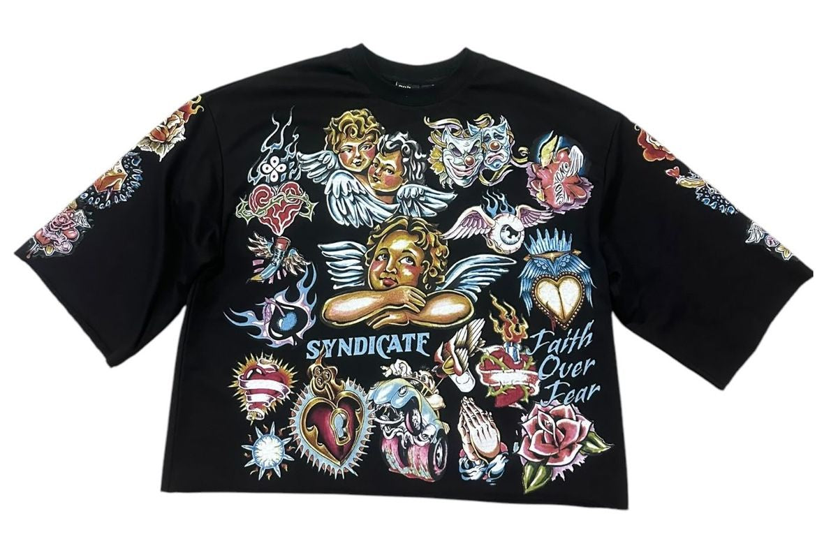 A close-up view of the Syndicate Faith Crop Black Tee showcasing its sleek black fabric and stylish design