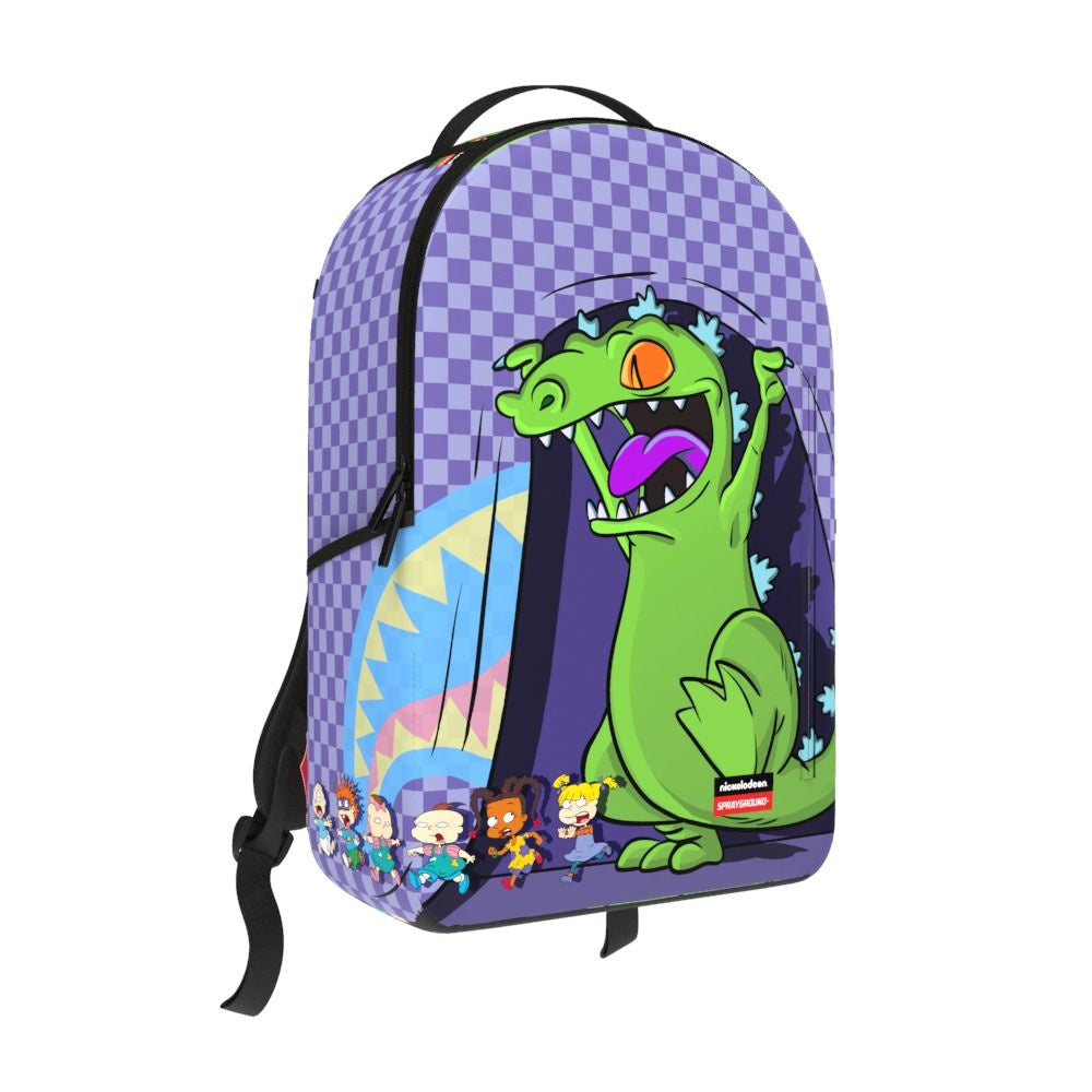 Brightly colored Sprayground Reptar Chase Backpack featuring a detailed Reptar design and sturdy PVC material