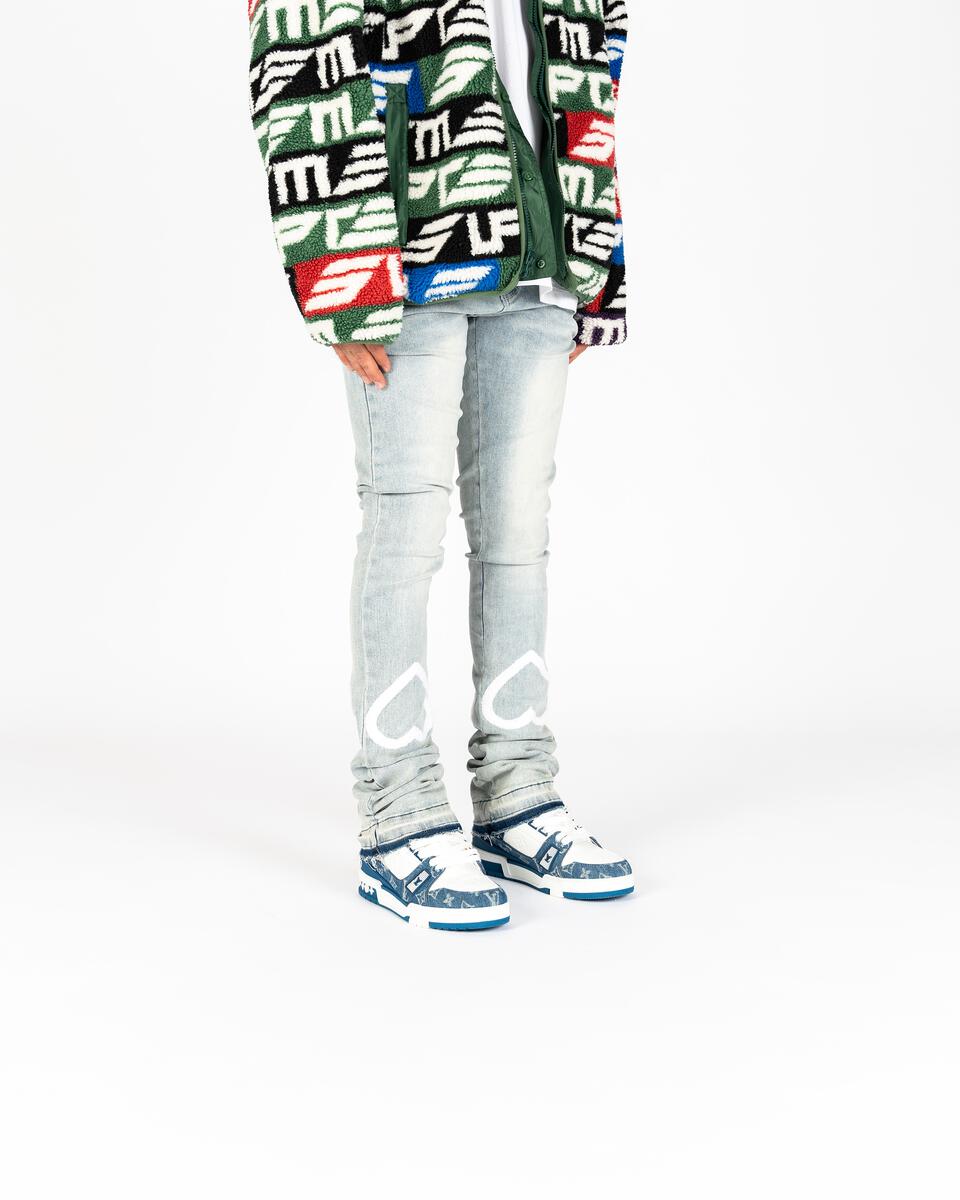 Close-up of PHEELINGS Luminous Love Light Blue Flare Stack Denim jeans with flare stack design