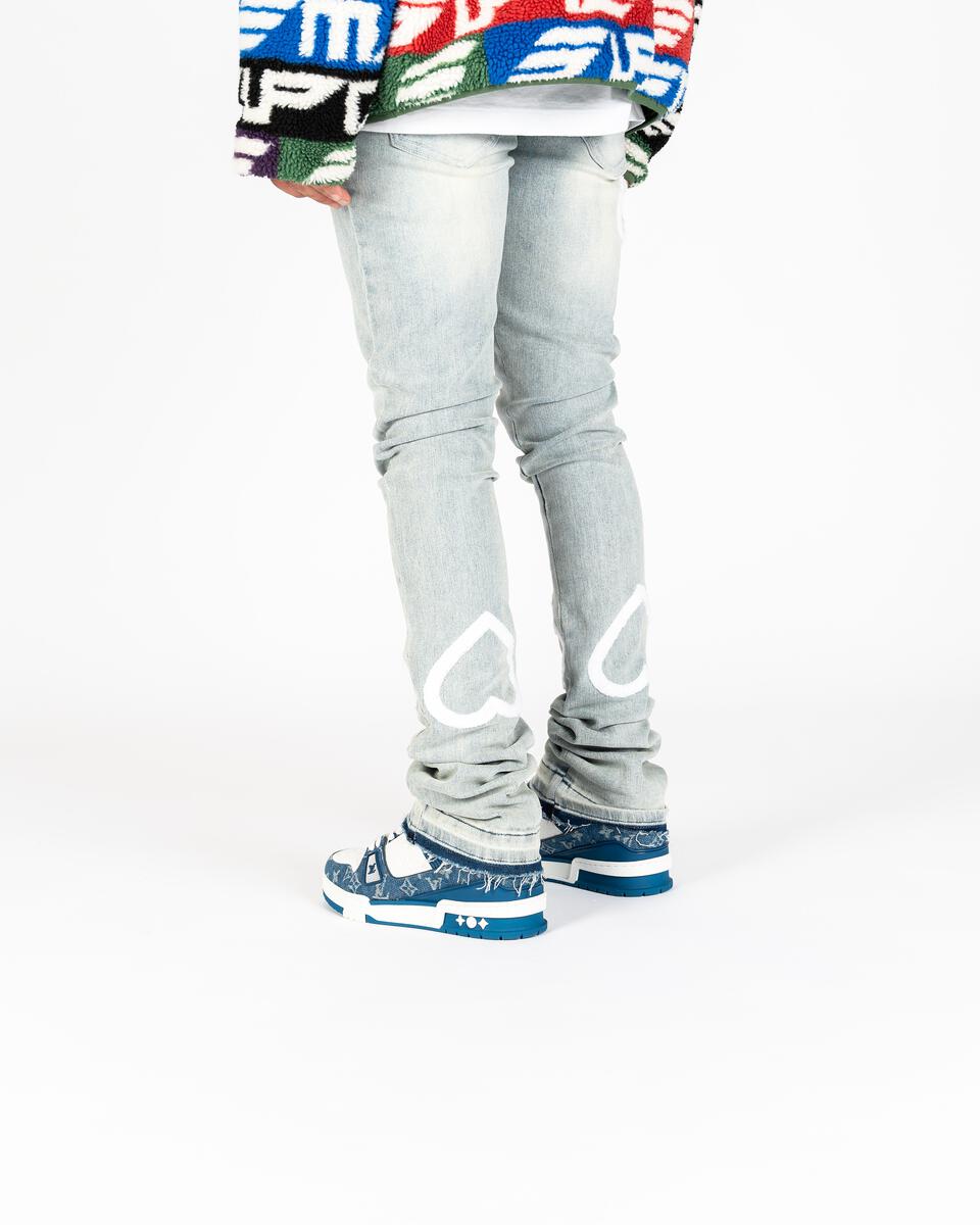 Side view of PHEELINGS Luminous Love Light Blue Flare Stack Denim jeans showcasing the light blue color