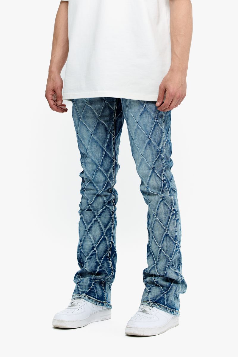 Valabasas Tire Blue Washed Stacked Denim Jeans close-up of distressed and faded wash effect