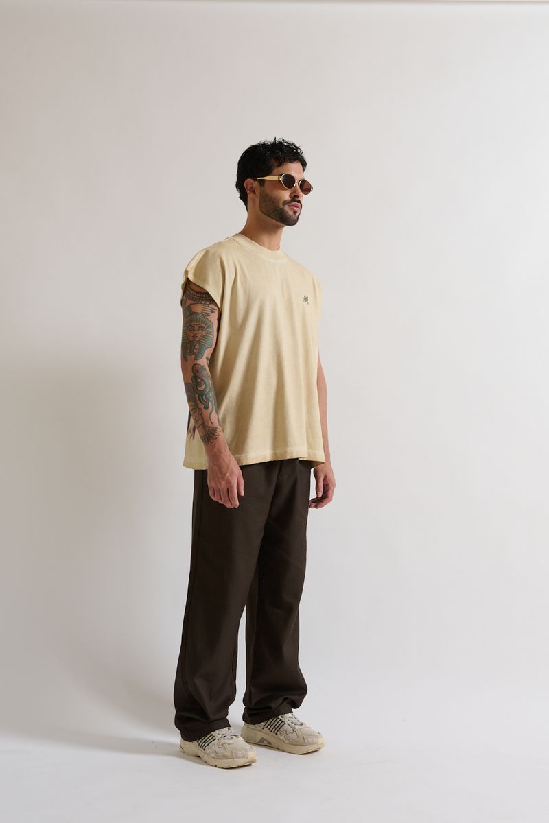 Rear view highlighting the simplicity and clean lines of the PURE Monclair Horses Cream Sleeveless Tee