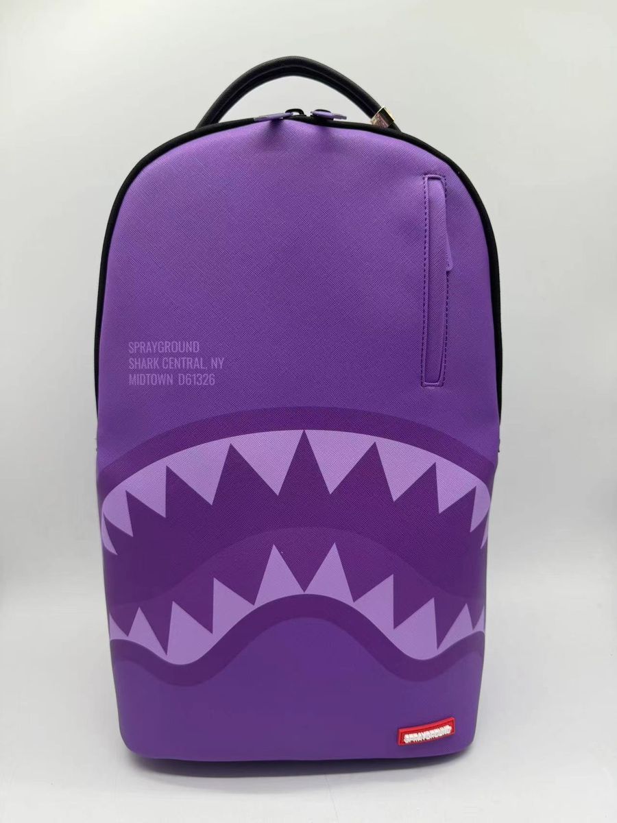 Spacious Sprayground Purple Shark Central Backpack measuring 18 by 115 by 65 inches with durable PVC construction