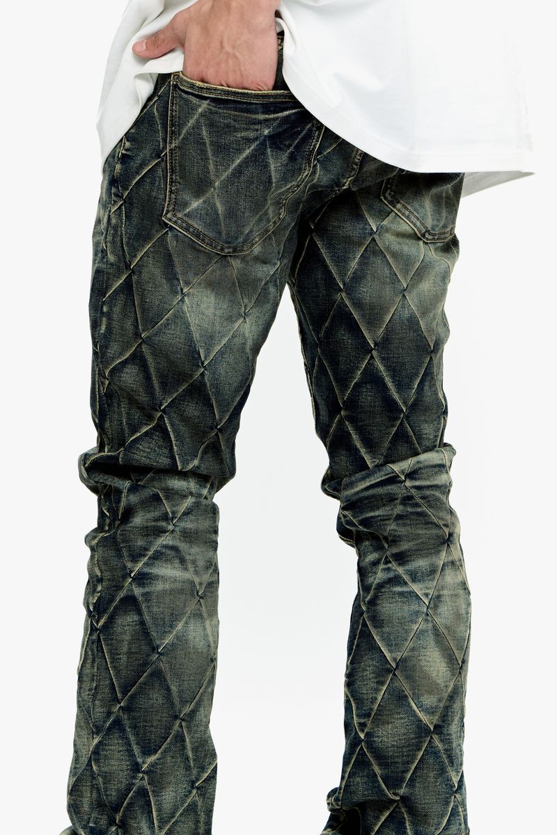 Vintage stacked denim jeans in blue with Valabasas tire design