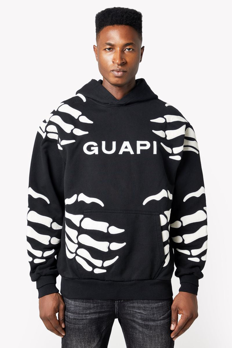 Guapi Obsidian Black Hell Dragger Hoodie: A sleek and stylish black hoodie with a striking design